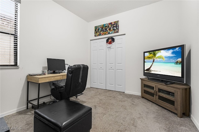 office area featuring light colored carpet