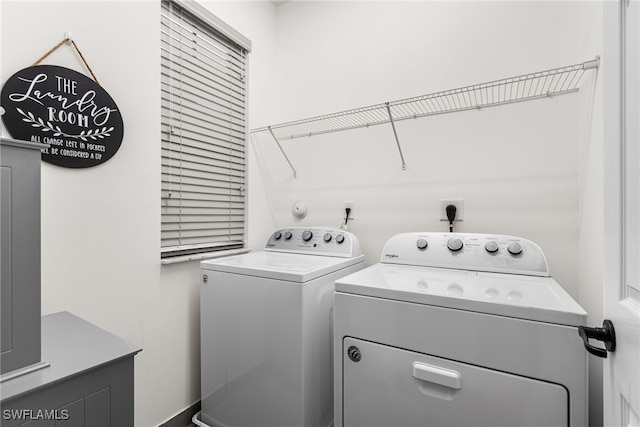 laundry room featuring separate washer and dryer