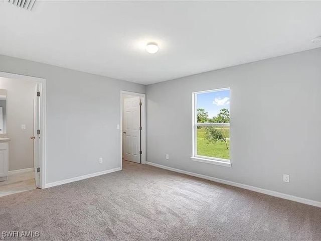 view of carpeted spare room