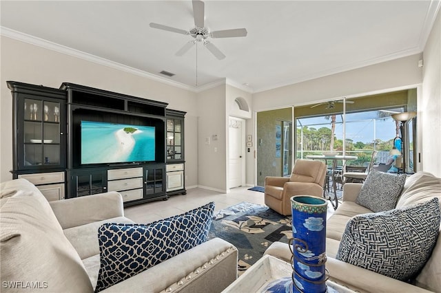 tiled living room with crown molding and ceiling fan