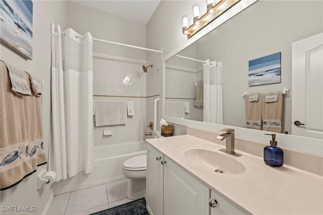 full bathroom featuring shower / tub combo with curtain, tile patterned floors, toilet, and vanity