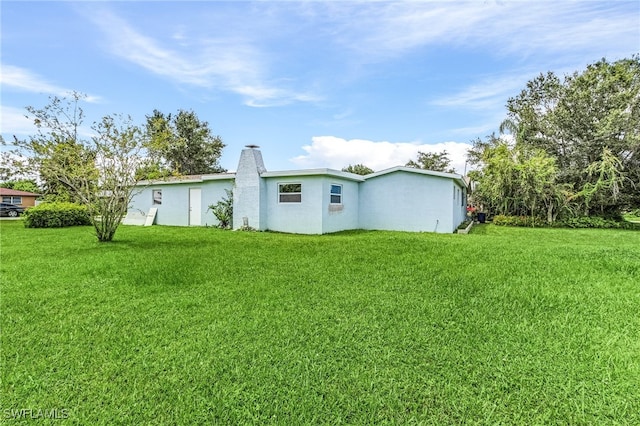 exterior space featuring a yard