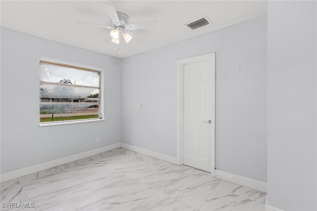 unfurnished room with ceiling fan