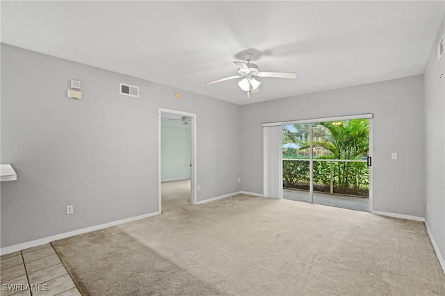 unfurnished room featuring light tile patterned flooring and ceiling fan