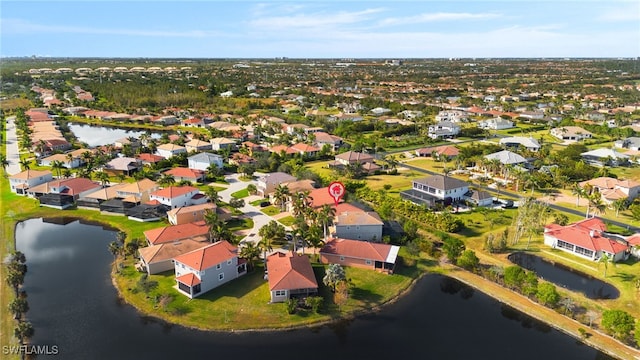 aerial view featuring a residential view and a water view