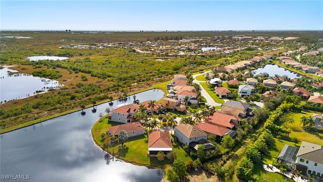 aerial view with a water view and a residential view