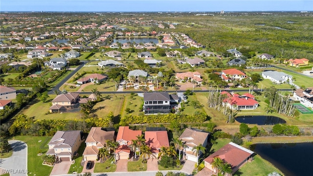 aerial view featuring a water view and a residential view