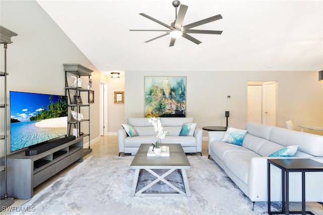 living room featuring lofted ceiling and ceiling fan