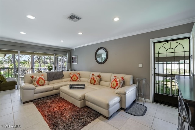 tiled living room featuring crown molding