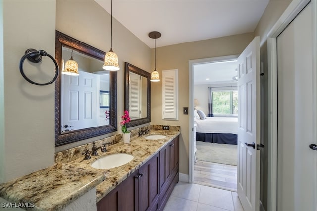 bathroom with vanity and tile patterned floors