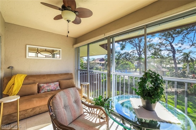 sunroom / solarium with ceiling fan