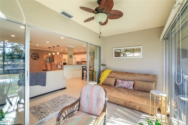 living room with ceiling fan