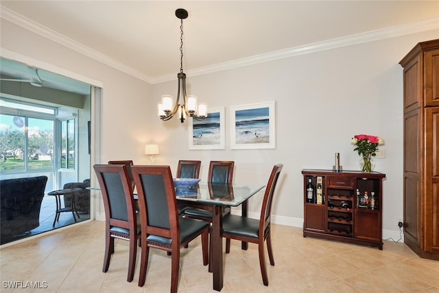 tiled dining area featuring crown molding and a chandelier