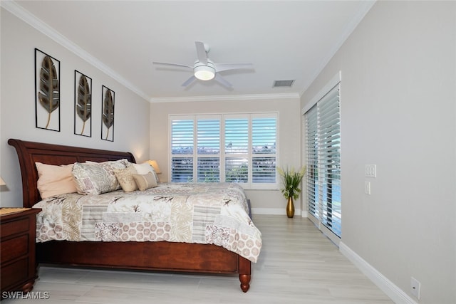 bedroom featuring crown molding and ceiling fan