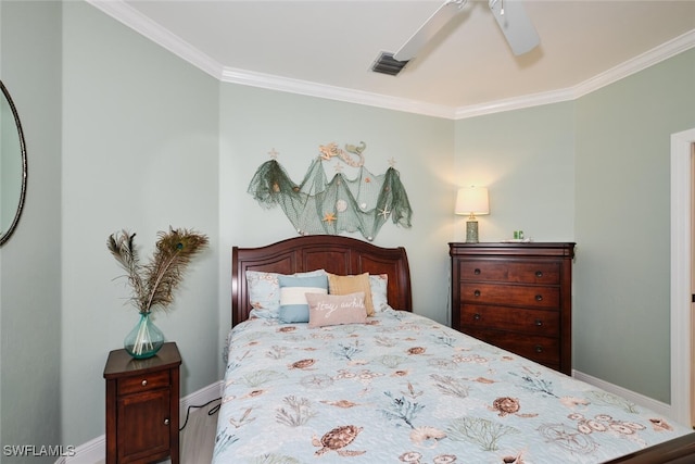 bedroom with ornamental molding and ceiling fan