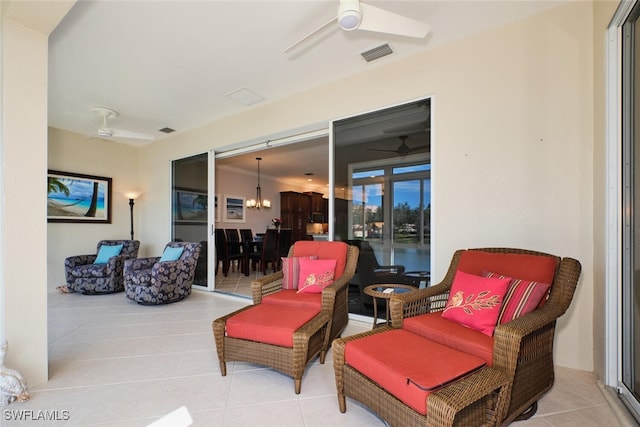 view of patio featuring ceiling fan