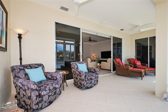 view of patio with an outdoor living space, ceiling fan, and french doors