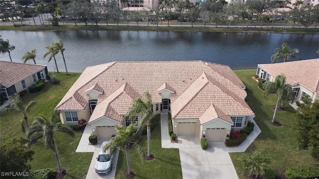 drone / aerial view with a water view