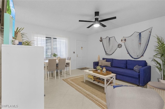 living room with light tile patterned flooring and ceiling fan