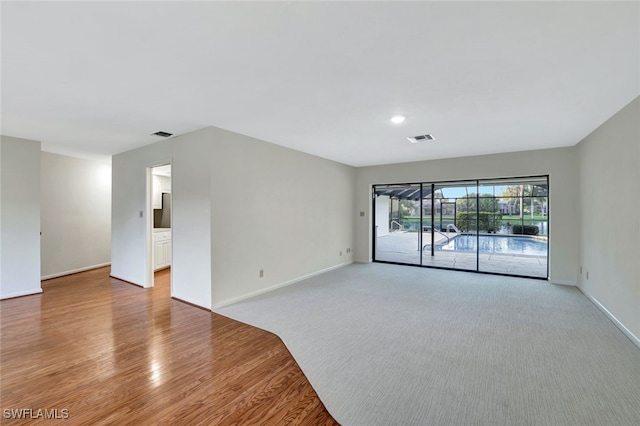 empty room featuring light hardwood / wood-style floors