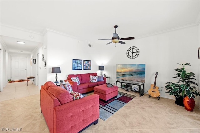 tiled living room featuring crown molding and ceiling fan