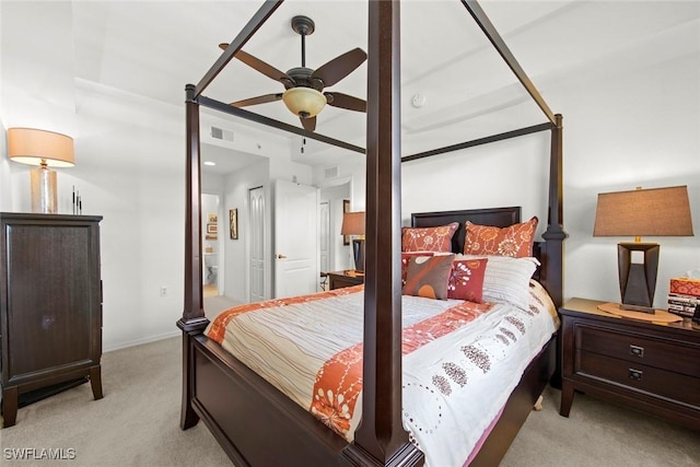 bedroom with light colored carpet and ceiling fan