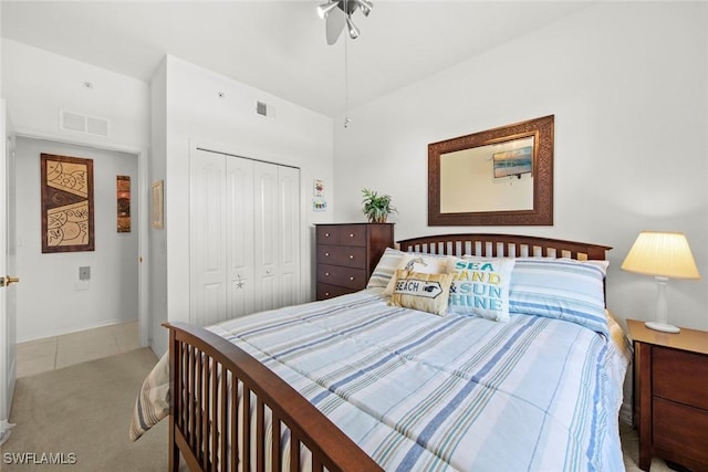 carpeted bedroom with a closet