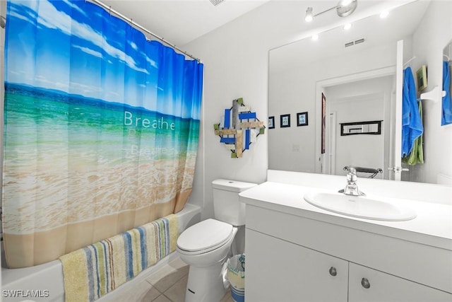 full bathroom with shower / tub combo, vanity, tile patterned flooring, and toilet