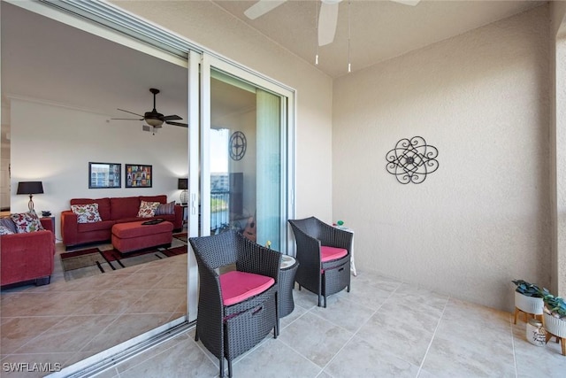 view of patio / terrace with ceiling fan and outdoor lounge area