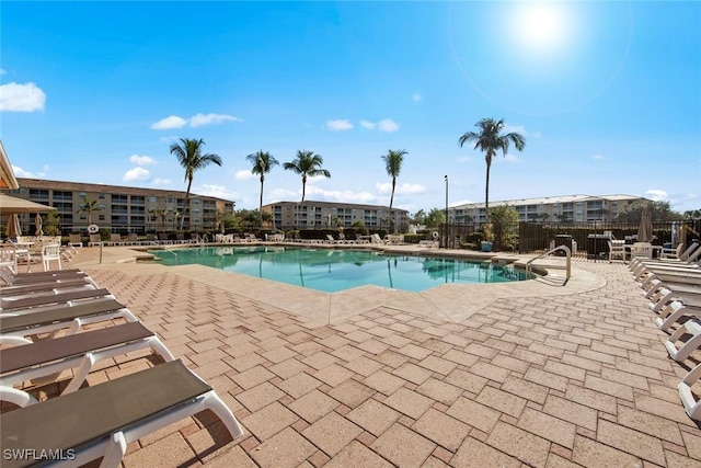 view of pool featuring a patio