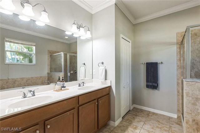 bathroom with an enclosed shower, vanity, crown molding, and tile patterned floors