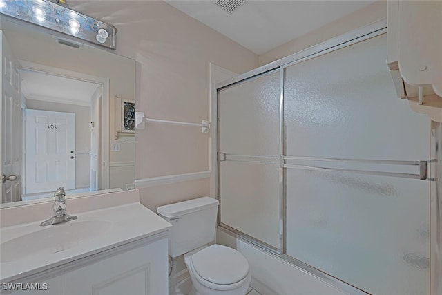 full bathroom with shower / bath combination with glass door, vanity, toilet, and water heater