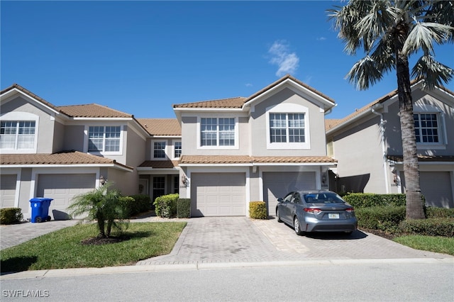 view of front of property with a garage