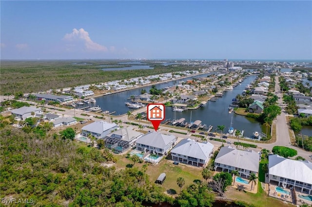 drone / aerial view featuring a water view