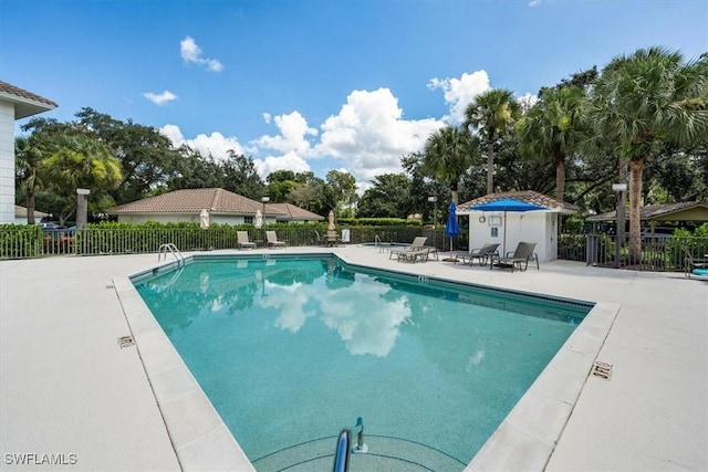 view of swimming pool featuring a patio