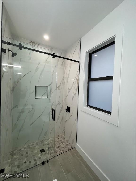 bathroom with walk in shower