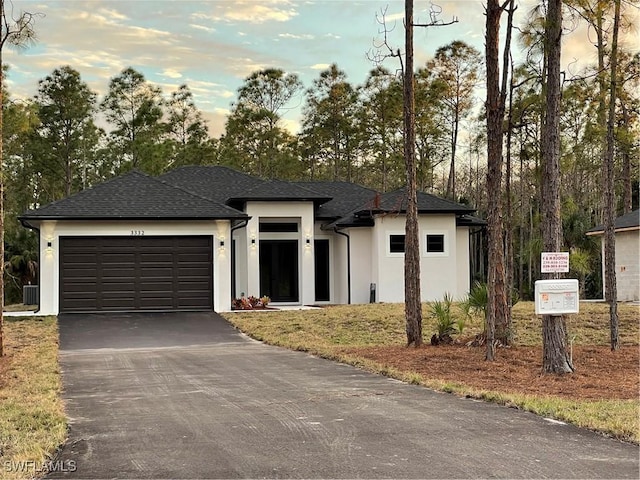 prairie-style house with a garage