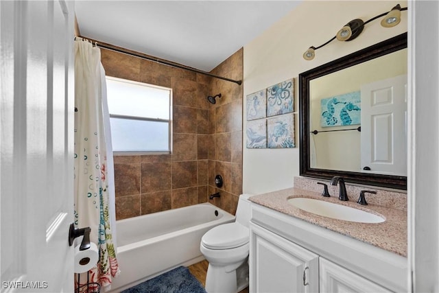 bathroom featuring shower / tub combo with curtain, vanity, and toilet