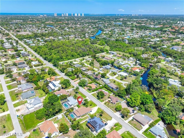 drone / aerial view featuring a water view