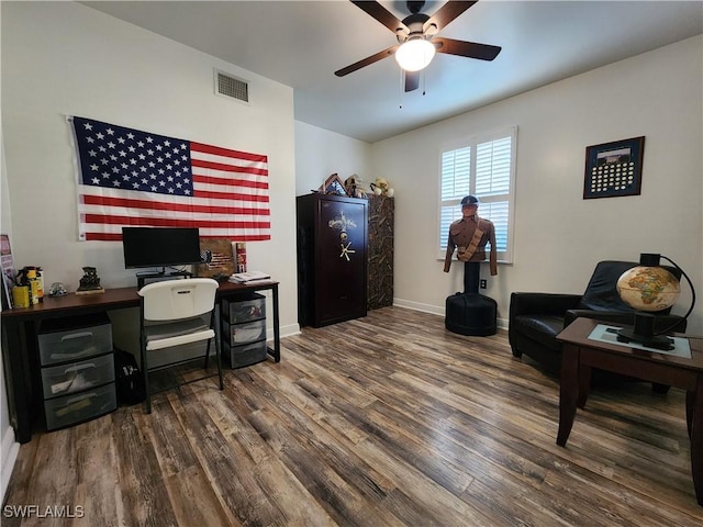 office with ceiling fan and dark hardwood / wood-style flooring