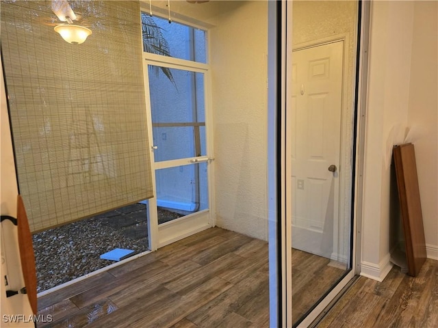 bathroom with hardwood / wood-style flooring