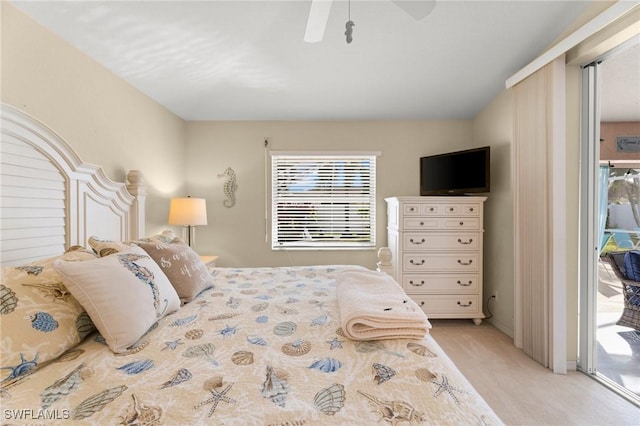 carpeted bedroom featuring ceiling fan and access to outside