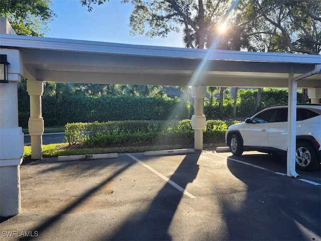 view of parking with a carport