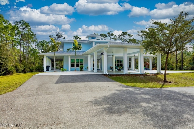 view of front of home with a front lawn