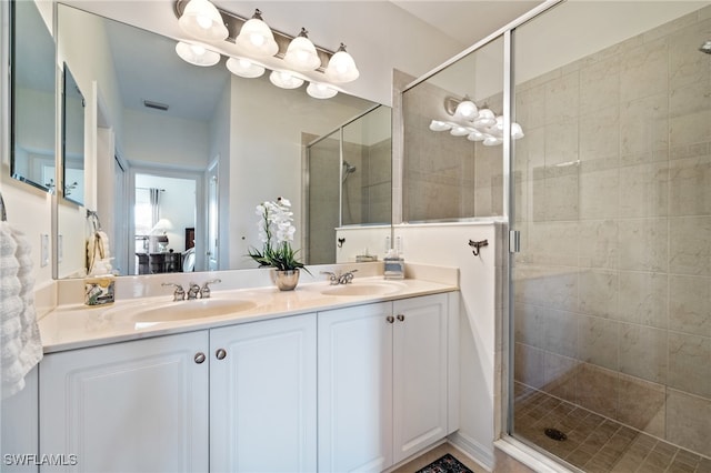 bathroom featuring vanity and walk in shower