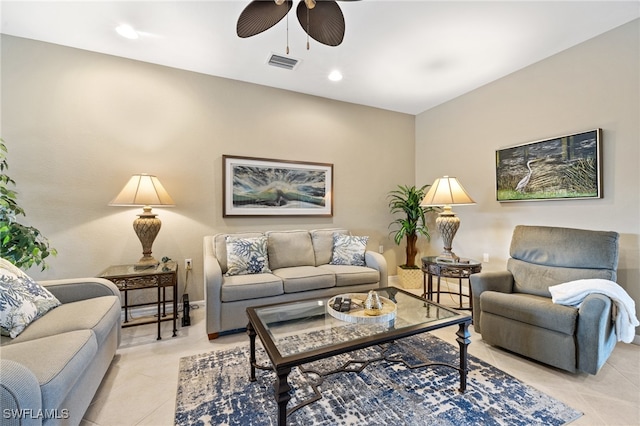 tiled living room with ceiling fan