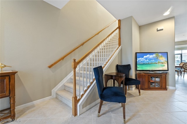 staircase with tile patterned flooring