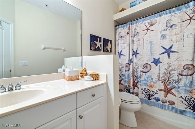 full bathroom featuring vanity, shower / tub combo with curtain, tile patterned floors, and toilet