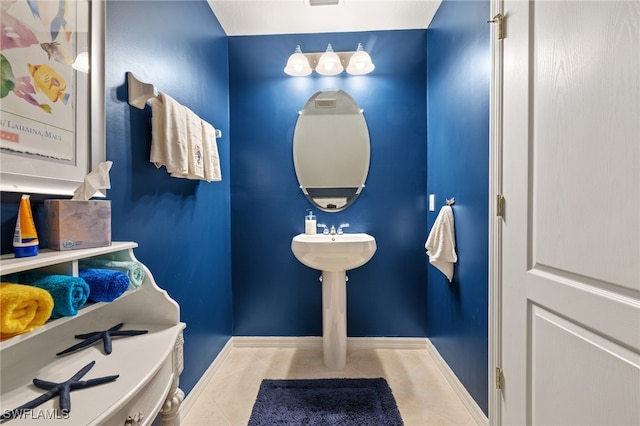 bathroom with tile patterned flooring