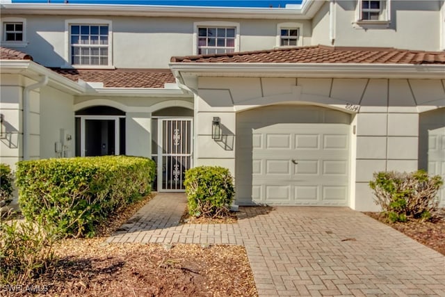 view of front of home featuring a garage